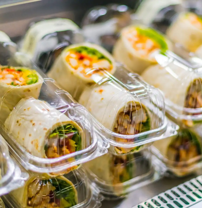Contact heat tooling for prepackaged food - wraps in convenient plastic containers